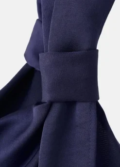 Asymmetrical dress with side gather