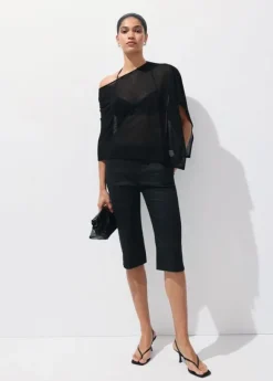 Asymmetrical knitted cape