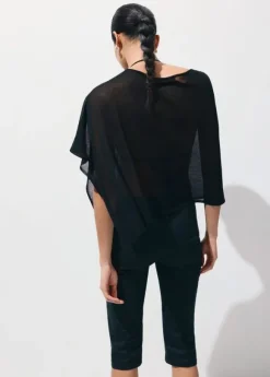 Asymmetrical knitted cape