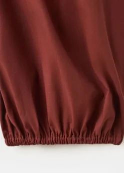 Balloon-style trousers with elastic