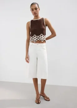 Floral-embroidered crochet top