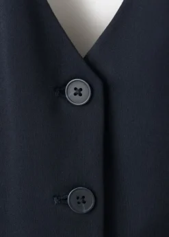 Halter-neck gilet with buttons
