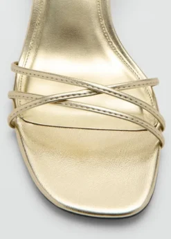 Heeled sandals with straps