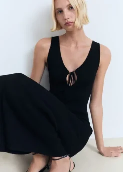 Knitted dress with bow neckline