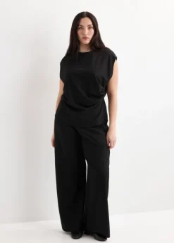Straight-fit trousers with elastic